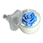 Load image into Gallery viewer, Blue rose-shaped candle inside a clear glass container on a white background
