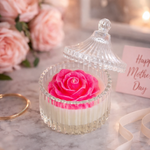 Load image into Gallery viewer, Pink rose-shaped candle in a glass container with a 'Happy Mother's Day' card in the background.
