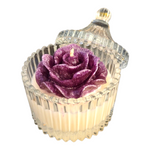 Load image into Gallery viewer, Decorative candle shaped like a purple rose in a glass holder on a white background
