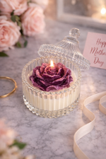 Load image into Gallery viewer, Decorative candle with purple rose in a glass holder on a marble surface, surrounded by flowers and a 'Happy Mother's Day' card.
